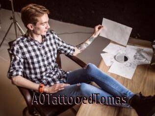 A0TattooedTomas